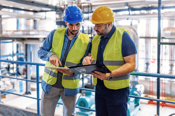 Two Engineers Wearing Reflective Vests - For Manpower Service